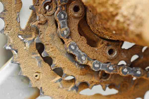Bicycle gears with dirt and grit demonstrating the resilience perseverance and grit helpful in college admissions